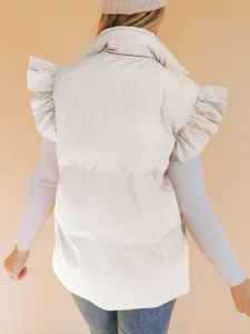 Back view of women casual winter beige puffer vest with stylish ruffle sleeves and stand collar.