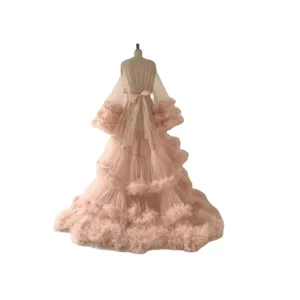 Pink mesh maternity photography dress, elegant long ruffled tulle gown for women staging performance.