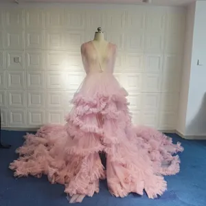 Elegant pink tulle deep V wedding dress with extra long ruffles train for photography