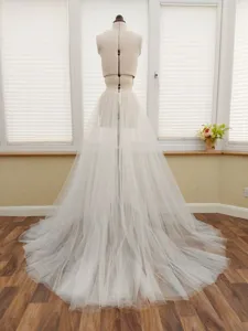 Details des weissen glitzernden doppelten Tüll-Brautrocks für wunderschöne Hochzeiten.