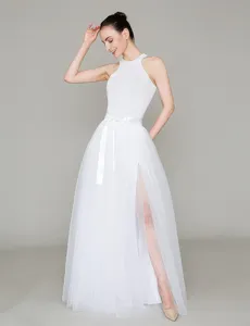 White mesh slit skirt detail view, elegant sleeveless top, studio backdrop photography showcase.