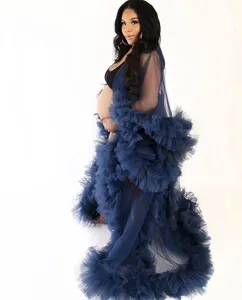 Long blue mesh maternity robe with ruffled details, perfect for studio photo shoots and bridal wear.
