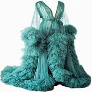 Luxury teal tulle maternity robe evening gown with dramatic ruffles for photo shoots.