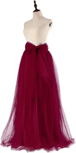 Detailed close-up view of the elegant burgundy tulle maxi skirt with a large waist bow.