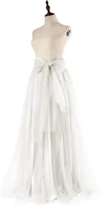 Detailed view of the elegant white tulle maxi skirt featuring a charming waist bowknot design.