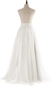Detailed view of the elegant white multi-layered tulle skirt, showcasing fine texture and layers.