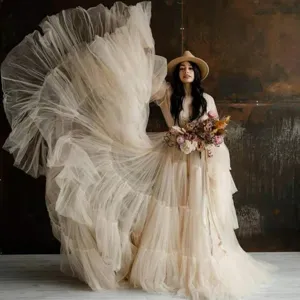 Stunning champagne tulle maternity dress with huge voluminous skirt for gorgeous photography shoot.
