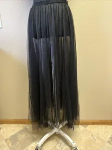 Black tulle mesh long skirt detail shot, high waist A-line layered fluffy costume skirt.
