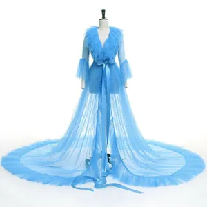 Light blue tulle maxi dress with ruffles and long train for photography and stage shows.