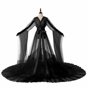 Black sheer mesh long sleeve robe with dramatic train and waist tie for photo studio.