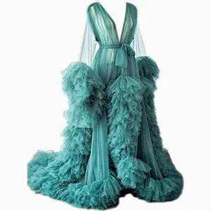 Luxurious tulle long bridal robe, dramatic ruffles and sweep train for photography and events.