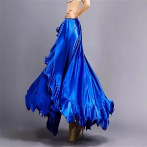 Detailed view of a royal blue satin dance skirt featuring dramatic ruffles and high waist.
