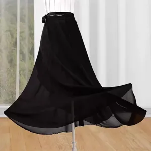 Detail view of the black chiffon long skirt with double layers and adjustable waist tie.