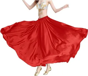Red satin belly dance skirt with large swing, smooth texture and flowing fabric for performance.