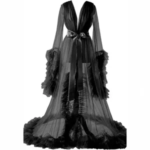 Black sheer tulle robe with long ruffled sleeves and satin belt for bridal photography and events.