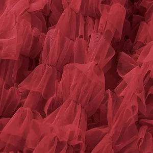 Burgundy layered tulle fabric detail, soft mesh texture for fluffy layered skirt design.