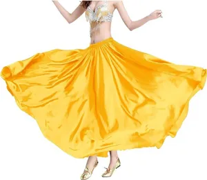 Detailed view of the vibrant yellow satin belly dance skirt with a large swing design.