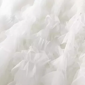 White layered mesh tulle fabric detail for women fluffy cake skirt elegant sheer material dress.