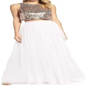 Stunning sequin crop top paired with a flowing white tulle long skirt for elegant wear.