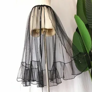 Black sheer mesh pearl skirt detail, lightweight wrap-around tie design for summer styling.