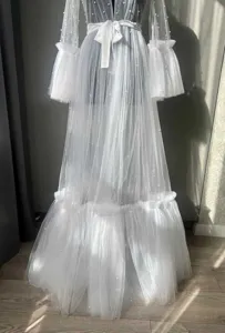White sheer mesh pearl robe detail, elegant bridal nightgown sleeve fabric style.