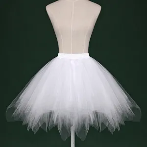 Detail view of the white fluffy tulle ballet skirt, showing delicate layered fabric texture.