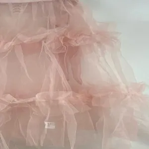 French vintage pink layered tulle skirt detail shot, sweet ruffled mesh midi skirt for summer.