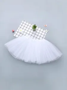 Adult white tulle tutu skirt for cosplay, party, dance performance and festive events. Fluffy layered design.