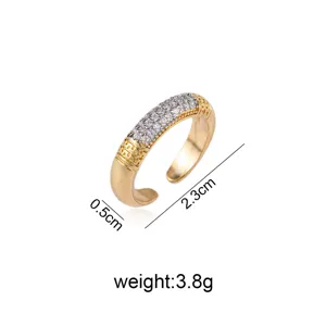 Detailed view of gold open ring with geometric crystal pave, size and weight specs.
