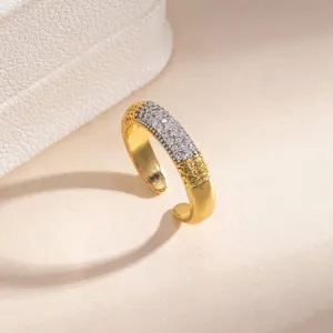 Exquisite gold open ring featuring sparkling rhinestones and delicate geometric patterns.