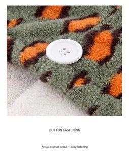 Detailed view of leopard print microfiber hair drying cap with secure white button fastening.