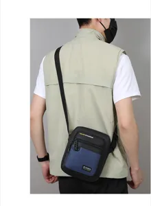 Men black blue crossbody bag detail view, casual outdoor single shoulder daily use bag.