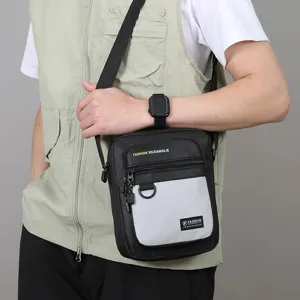 Men's casual crossbody bag, stylish black and grey design, perfect for daily commute and outdoor travel.