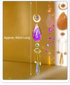 Natural purple agate slice suncatcher detail with crystal prisms and gold moon charm.