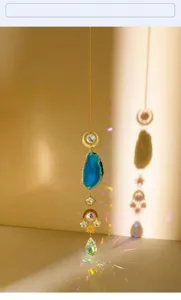 Natural blue agate slice suncatcher detail, crystal prism rainbow maker window hanging.