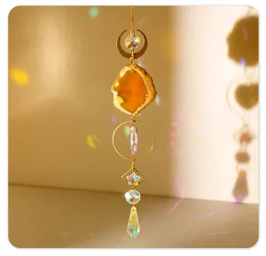 Natural agate suncatcher detail shot, rainbow crystal wind chime pendant for home decor.