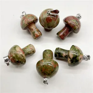 Detailed shot of natural crystal unakite mushroom shaped pendant jewelry DIY accessories.