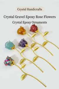 Detailed close-up of colorful crystal gravel epoxy rose flower ornaments with golden stems.