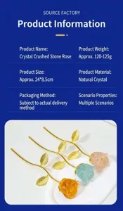 Detail view of crystal crushed stone rose flower home decor ornament with gold stem and leaves.