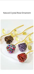 Close-up detail of crystal gemstone rose flower ornament with shiny golden stem and leaves.