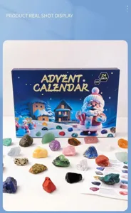 Detail view of colorful raw crystal gemstones and advent calendar box, perfect gift showcase.