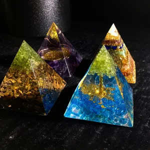Handmade crystal resin pyramid desktop decor with gemstone chips and lucky tree design.