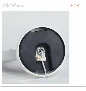 Crystal stone LED desk lamp base detail showing power cord and metal screw structure.