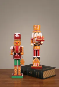 Wooden nutcracker detail shot, exquisite handmade painted gingerbread theme desktop decor.