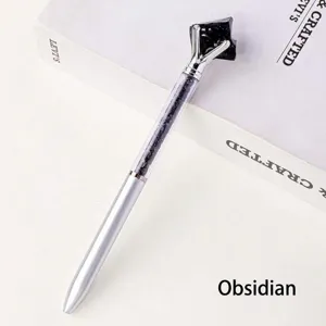 Creative natural crystal stone ballpoint pen detail view, elegant metal office stationery writing tool.
