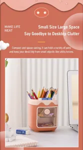 Cute pig pen holder storage box with transparent door and multiple grids for desk organization.