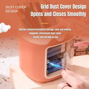 Cute cartoon multi-grid desktop pen holder stationery storage box with dust cover.