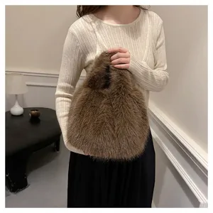 Trendy fluffy faux fur handbag for women, cozy winter plush tote bag, elegant fuzzy brown purse.