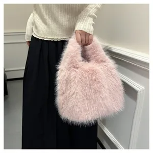 Pink fluffy handbag winter plush tote bag detail view showing soft faux fur texture.