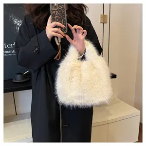 Soft fluffy faux fur handbag detail view, elegant plush winter bucket bag fashion accessory.
